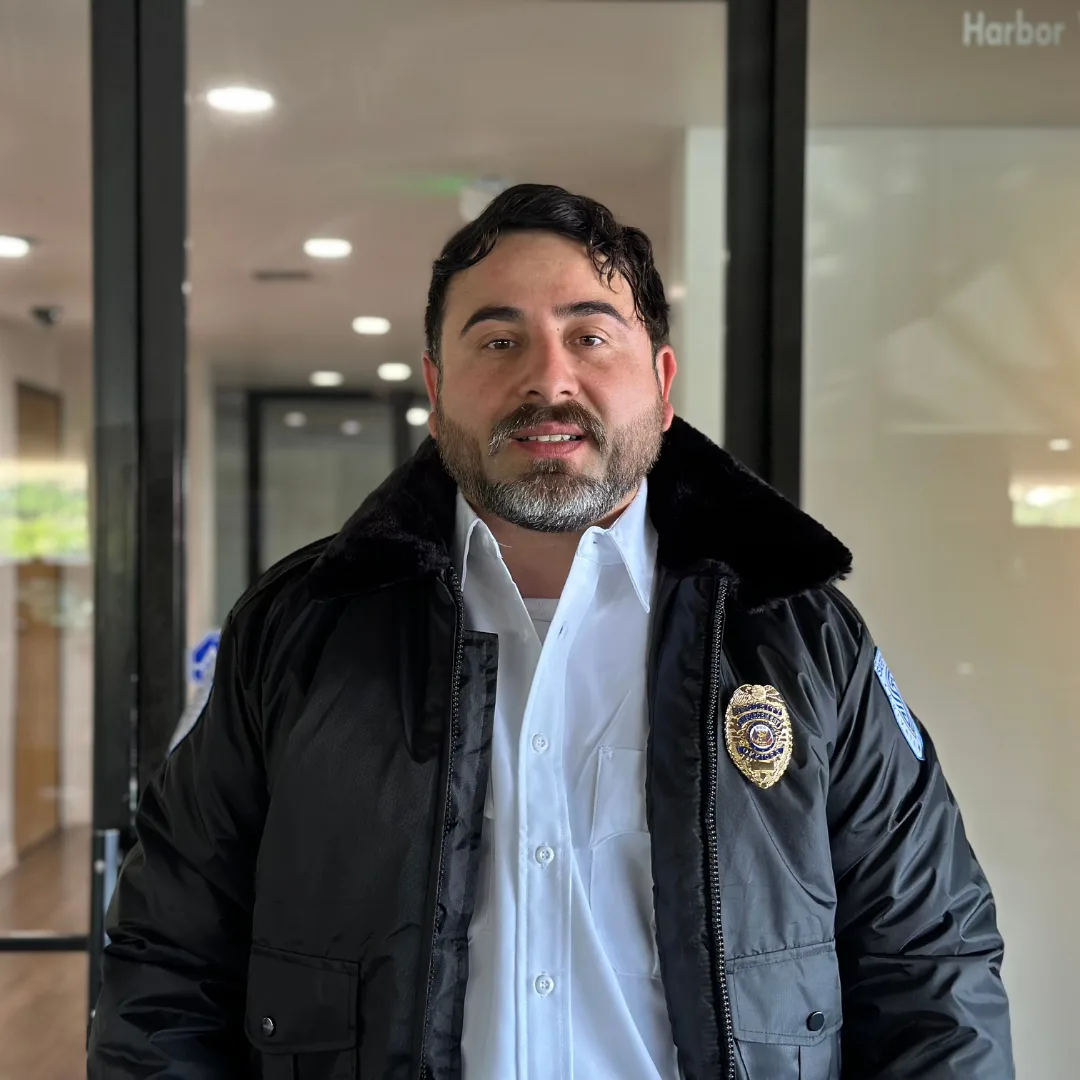 Armed Safety Zone officer in uniform at a client site