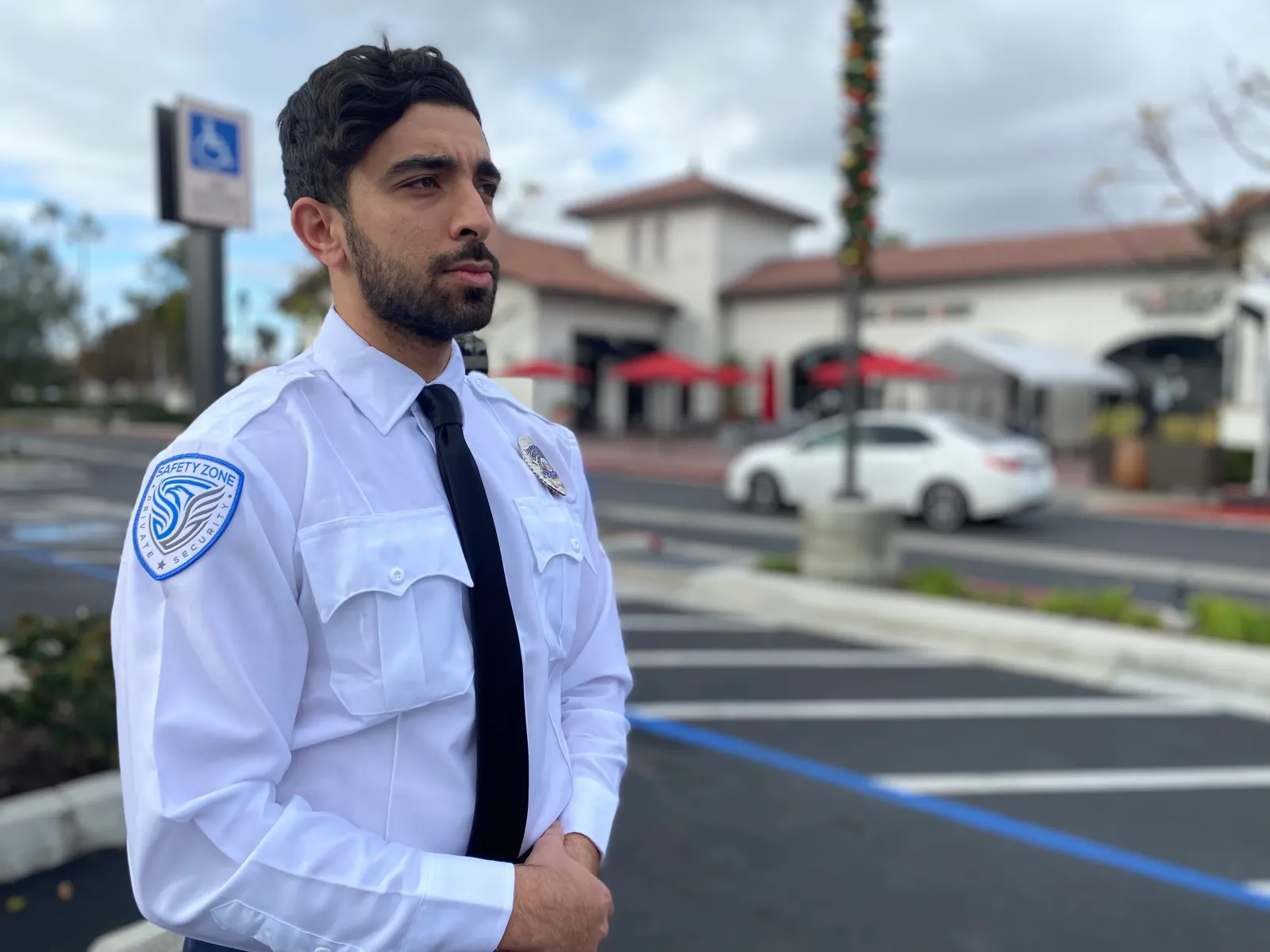 Safety Zone Security officer watching over a retail plaza